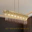 Lustre en cristal de style moderne de 39 po avec un design linéaire rectangulaire avec une finition dorée, un luminaire suspendu élégant avec des perles en cascade