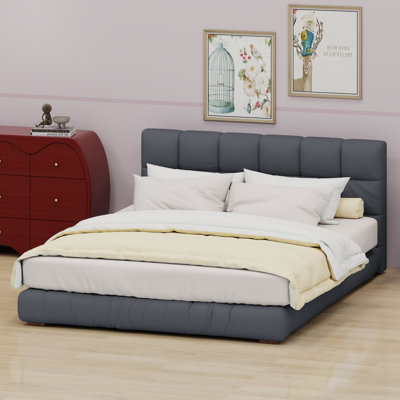 Platform bed frame with channel tufted headboard and built-in slat support for modern low profile style