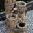 Cronan 4-Tier Outdoor Cascading Water Fountain with Pelican and Pier Post Design