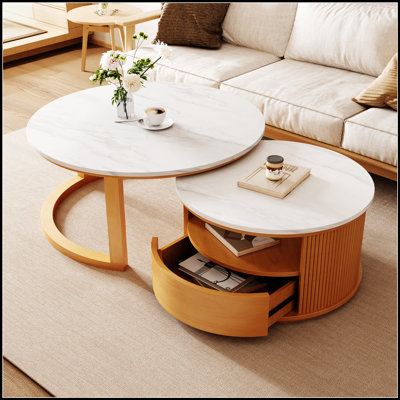 Table basse ronde avec plateau en marbre blanc, rangement à 2 niveaux et 1 tiroir, parfaite pour les espaces de vie modernes et élégants.