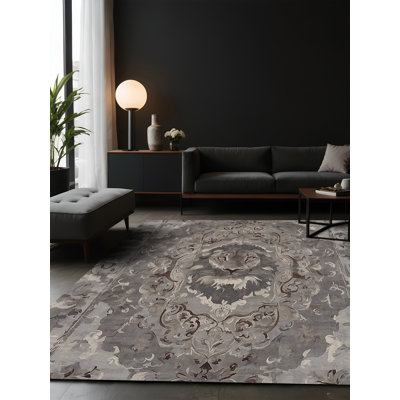 Tapis gris soyeux et moelleux