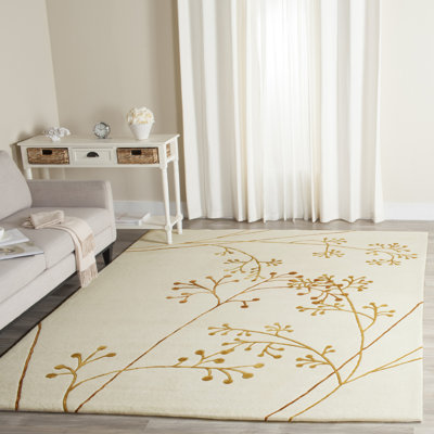 Tapis ivoire en laine touffeté à la main Avayah