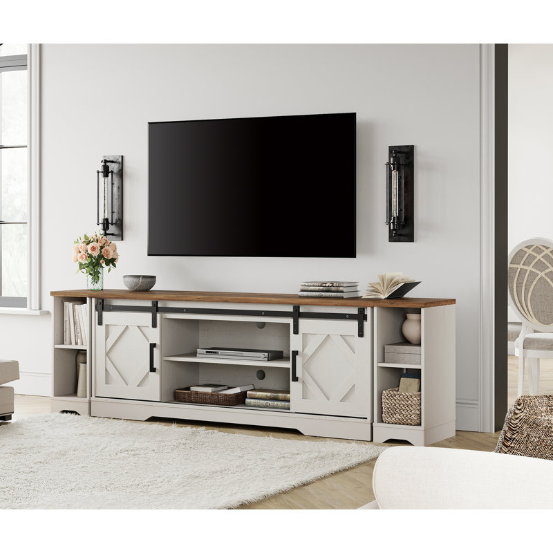 Laziza 78.6" W TV Stand for TVs up to 85" with Sliding Barn Doors and Open Storage, Cream White