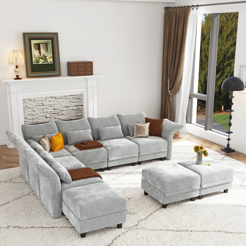 Canapé modulaire symétrique en microfibre avec repose-pieds Caralina, Microfibre / microsuède gris clair