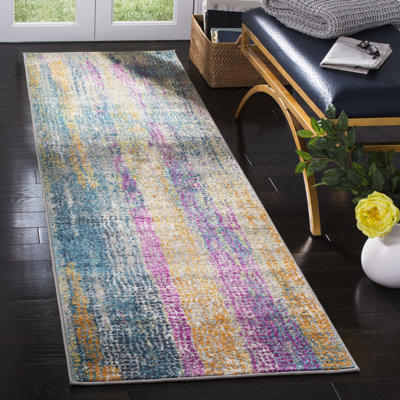 Tapis abstrait bleu / fuchsia Felty
