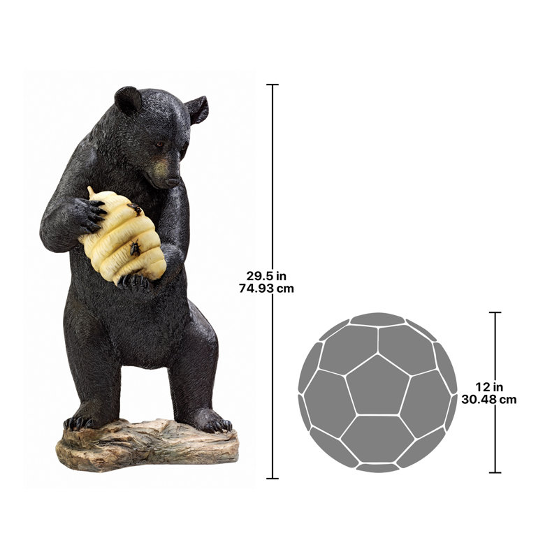 Statue de ruche et d'ours noir
