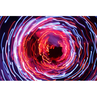 Abstract Background Of Light Trails by Maksime - Wrapped Canvas Print