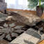 Tapis rond beige et gris à motif floral tissé à la machine 8 pi