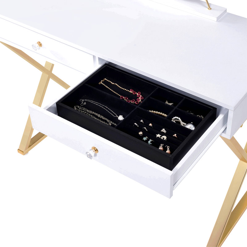 Bureau de coiffeuse à finition dorée avec miroir et plateau à bijoux