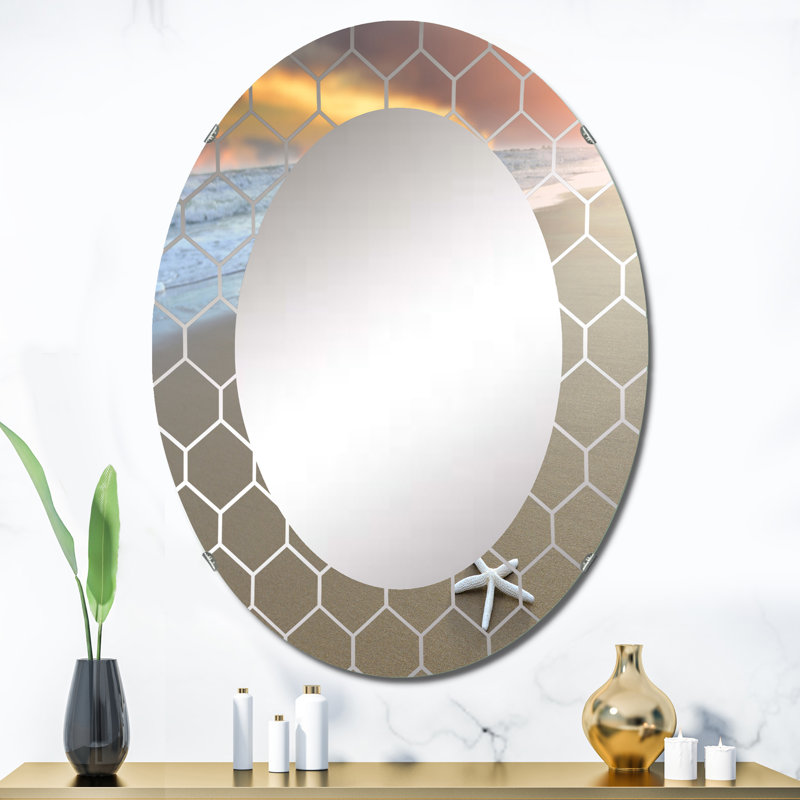 Étoile de mer sur une plage - miroir mural nautique et côtier, 36 po x 24 po