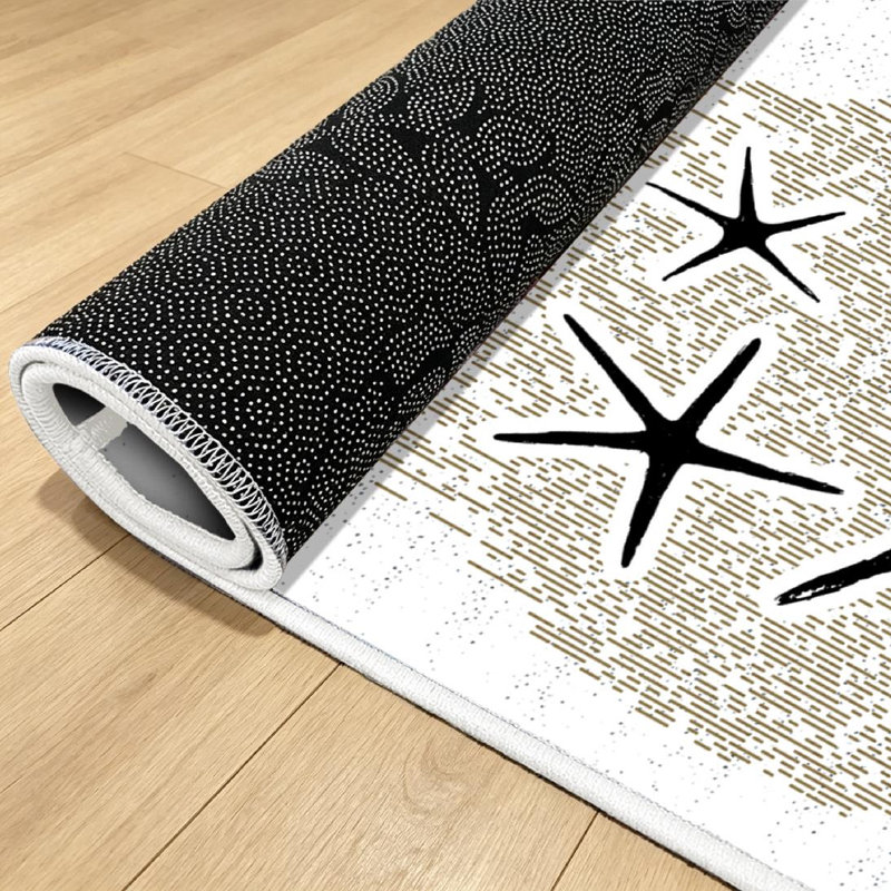 Tapis noir lavé à la machine à motif d'étoiles de mer