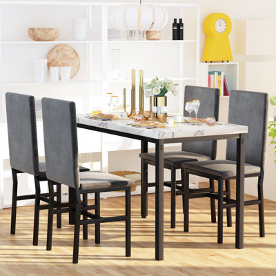 Ensemble repas 5 pièces avec chaises rembourrées en velours Janece