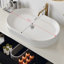 Meuble-lavabo mural avec lavabo ovale en céramique, conception flottante, armoire en bois massif multicouche, tiroirs à fermeture en douceur et rangement ouvert pour les salles de bain modernes