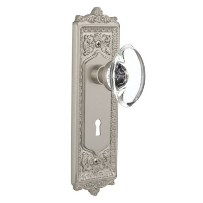 Egg & Dart Plate with Decorative Keyhole and Oval Clear Crystal Door Knob