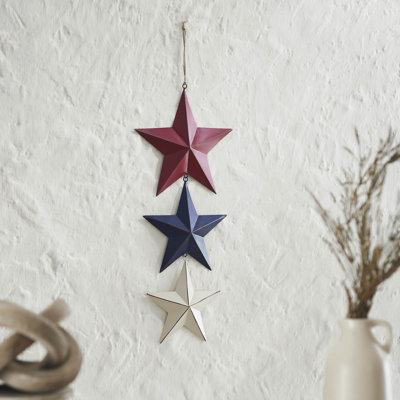 Décoration murale festive en métal peint avec des ficelles en jute 20 x 8 x 1