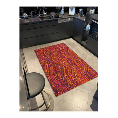 Tapis décoratif créatif moderne avec motif à rayures ondulées