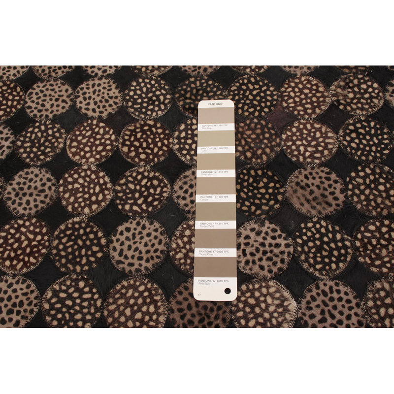 Tapis décoratif en cuir brun fabriqué à la main à motif géométrique