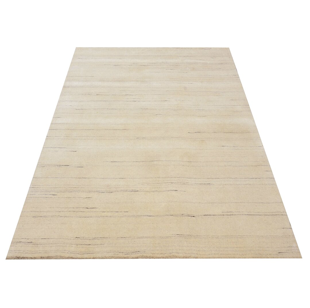 Handgefertigter Teppich Astral aus Wolle in Beige