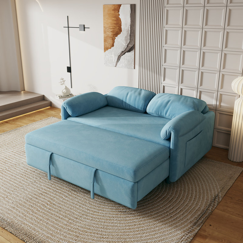 Présentation du canapé: canapé-lit en velours bleu - un bijou de salon à double usage avec option de lit escamotable