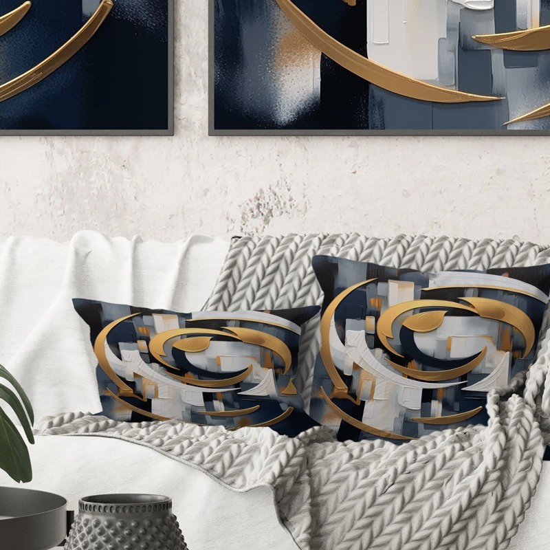 Coussin décoratif à formes abstraites dorées et or blanc