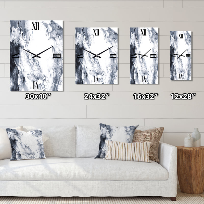 Horloge murale abstraite en métal noir et blanc liquide I, Petit