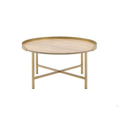 Table basse en chêne et finition dorée