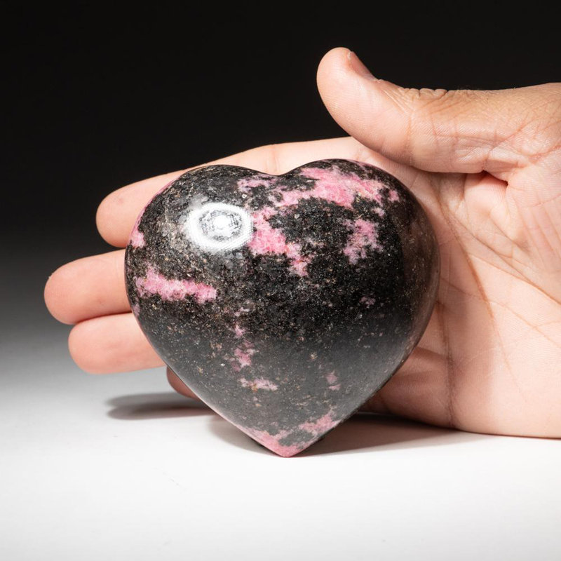 Polished Imperial Rhodonite Heart From Madagascar (400 Grams), 3" H x 1.25" W x 3.5" D, Black/Pink