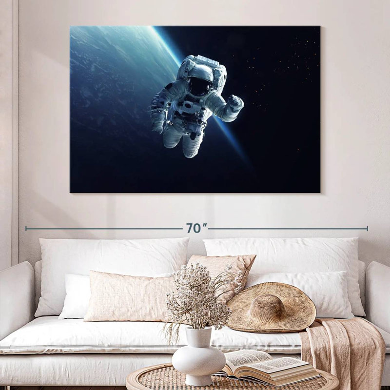 Un astronaute d'Oberle flottant dans l'espace, H 24 po x l 36 po