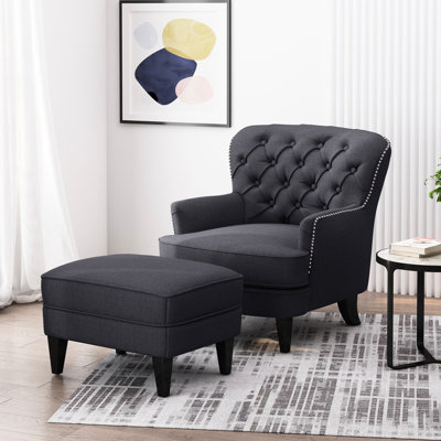 Fauteuil club contemporain et repose-pieds en bouleau stable en tissu gris reposant avec des pieds
