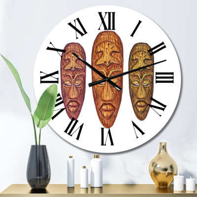 Trois masques tribaux en bois - horloge murale rétro