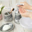 Distributeur de savon gris / argent brossé
