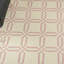 Tapis ivoire / rose Garnier-259741138