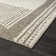 Tapis tribal à motif géométrique brun