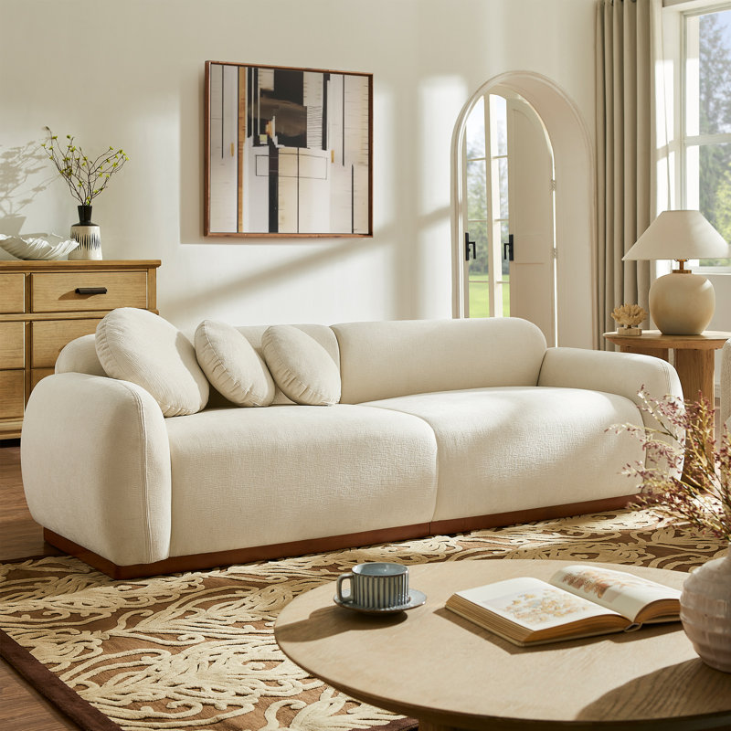 Canapé 90 po en chenille rembourrée avec silhouette arrondie, coussins décoratifs et base en bois massif, beige