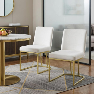 Ensemble de deux chaises d'appoint en velours blanc et or