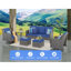Un canapé trois places + deux chaises pivotantes + deux repose-pieds + une table d'appoint