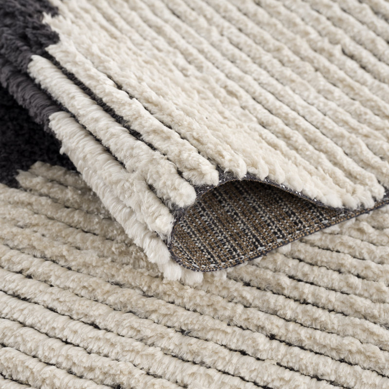 Allie Black & Ivory Synthetic 5' x 7' Easy-Care Area Rug