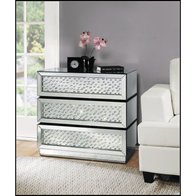 Armoire avec miroir et faux cristaux avec 3 tiroirs, idéale pour un rangement glamour et une présentation élégante.