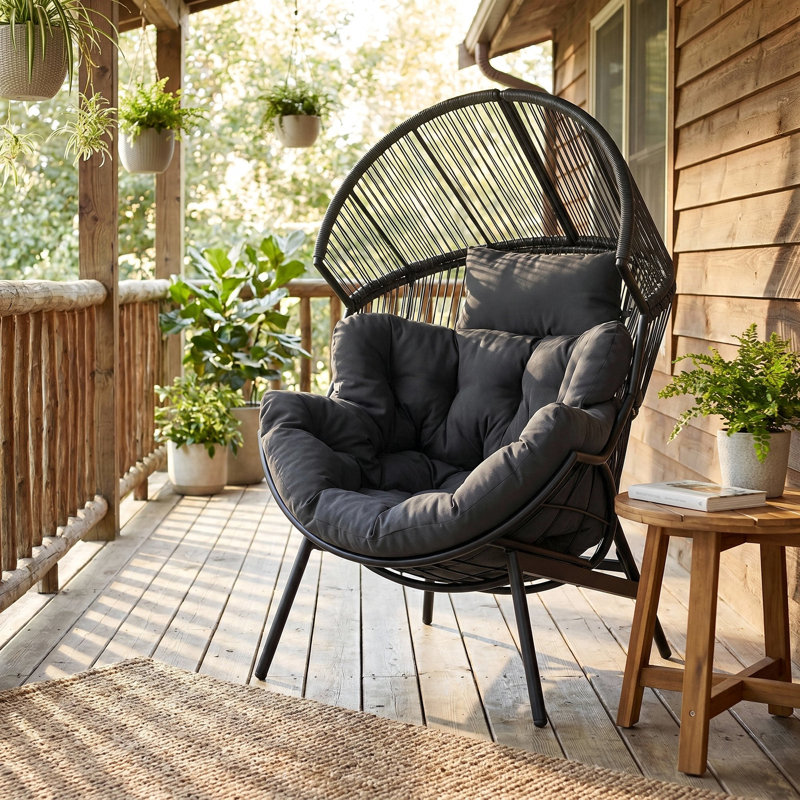 Fauteuil intérieur / extérieur en osier avec coussins