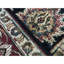 Tapis noir et rouge de haute qualité noué à la main