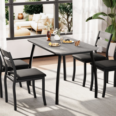 Ensemble de table de salle à manger 5 pièces pour 4 personnes, table de cuisine d'appoint avec chaises rembourrées grises, mobilier moderne peu encombrant avec structure en métal noir, gris et noir