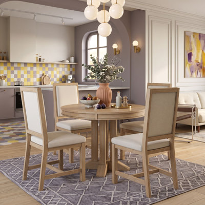 Ensemble de salle à manger rond extensible cinq pièces avec quatre chaises rembourrées
