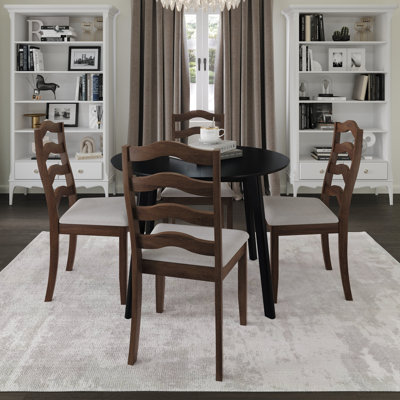 Ensemble de salle à manger 5 pièces avec table ronde noire et chaises à dossier en lattes horizontales rembourrées