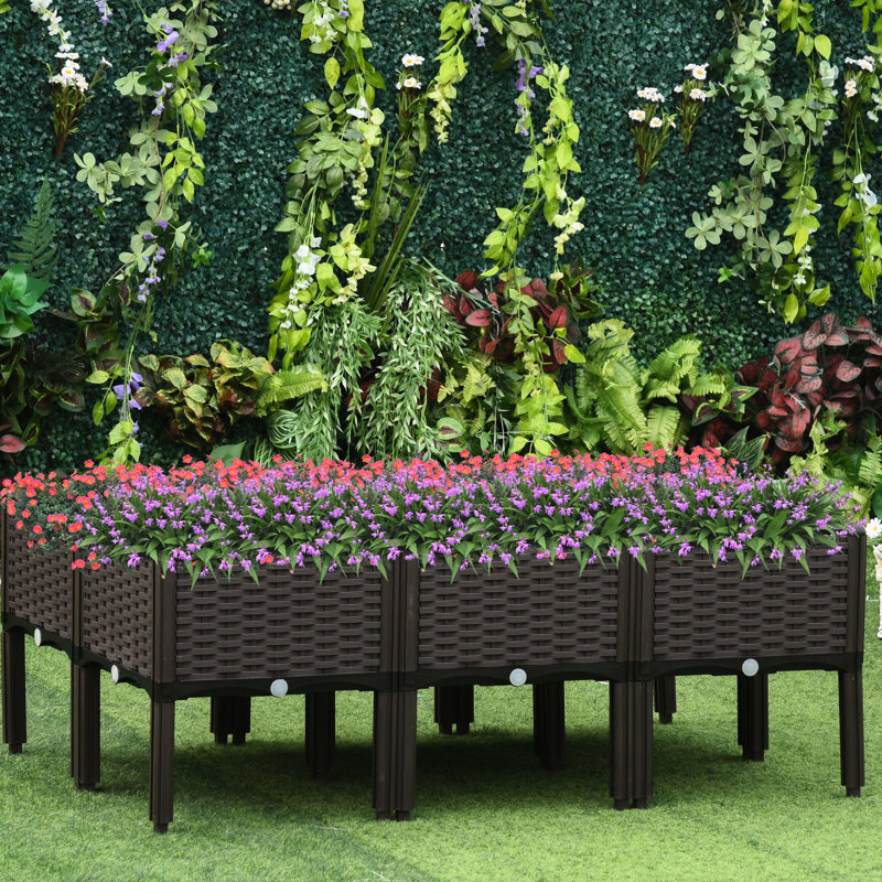 Ensemble de jardinière surélevée - 6 jardinières surélevées à arrosage automatique pour fleurs et herbes aromatiques d'extérieur. Compactes et pratiques. Dimensions : 39,5 cm (L) x 44,9 cm (L) x 44,9 cm (H). En polypropylène. Motifs végétaux.