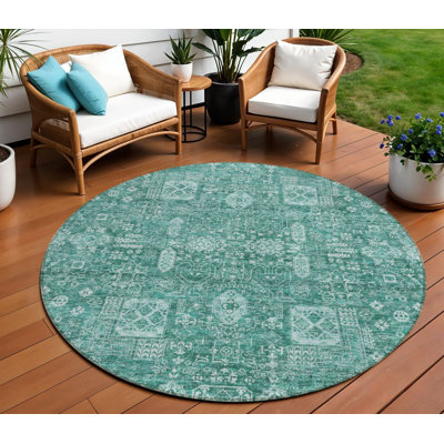 Tapis rond 8 po vert foncé et turquoise
