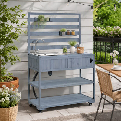 Îlot de cuisine extérieur avec évier, tablettes mobiles et ouvre-bouteille