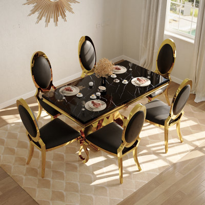 Ensemble de table de salle à manger de luxe noir et doré avec 6 chaises en cuir noir