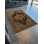 Tapis décoratif à motif frangé noir et orange