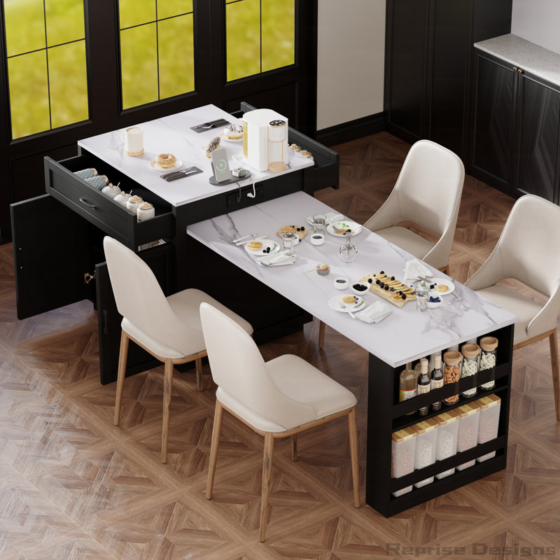 Îlot de cuisine avec table de salle à manger avec rangement et prise de courant