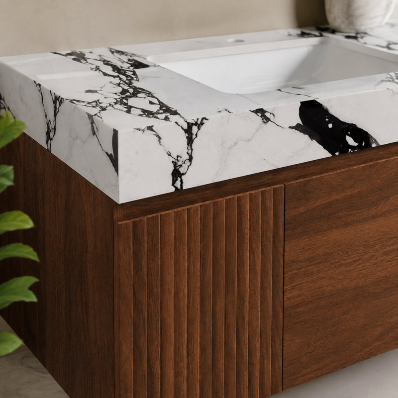 Meuble-lavabo suspendu de 90,5 cm (35,64 pouces) avec comptoir en pierre frittée sans joint et lavabo en céramique, fixé au mur, avec tiroir et armoire à fermeture amortie.